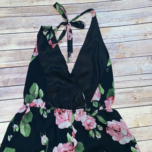 Black Floral Rose Halter Backless Romper with Ruffle Hem - Picture 6 of 7